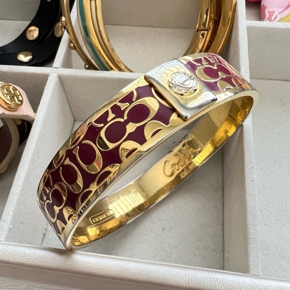Coach Jewelry - Coach Signature "C" Hinged Bangle Bracelet in gold and burgundy